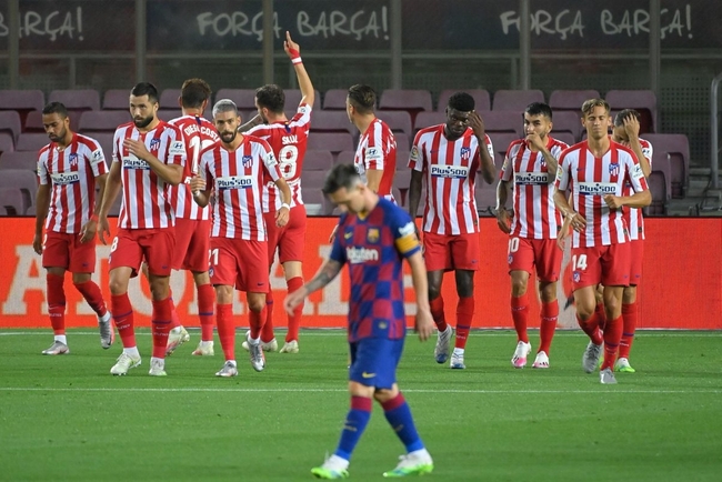 ក្រុមកីឡាករ At Madrid និង Lionel Messi